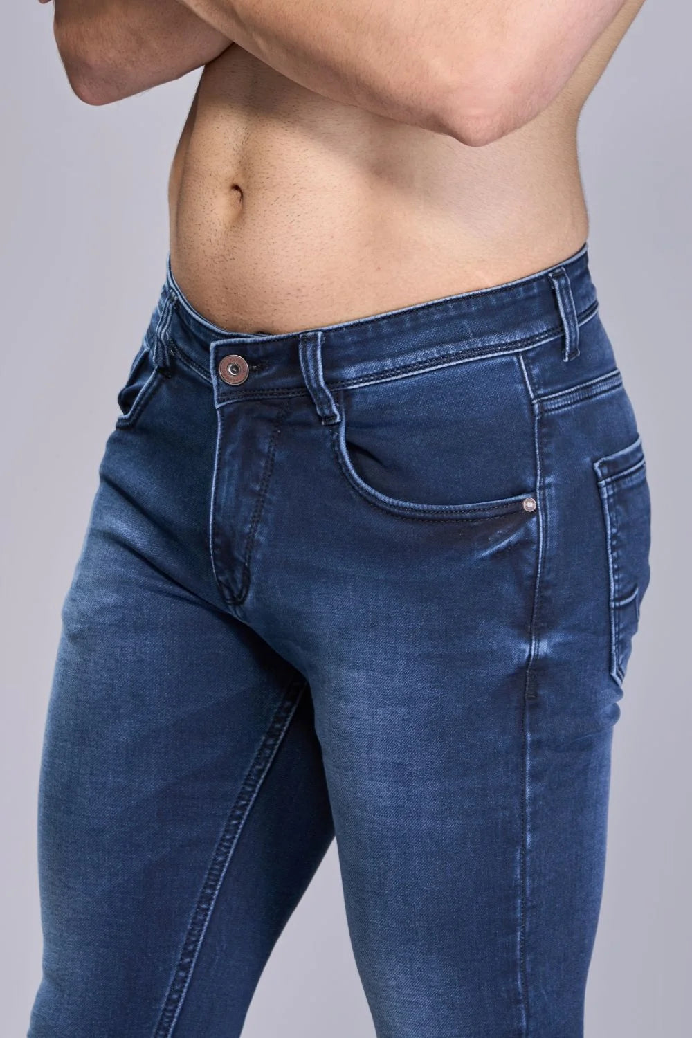 Pocket and stitching details of boys ankle length jeans in Oxford Blue
