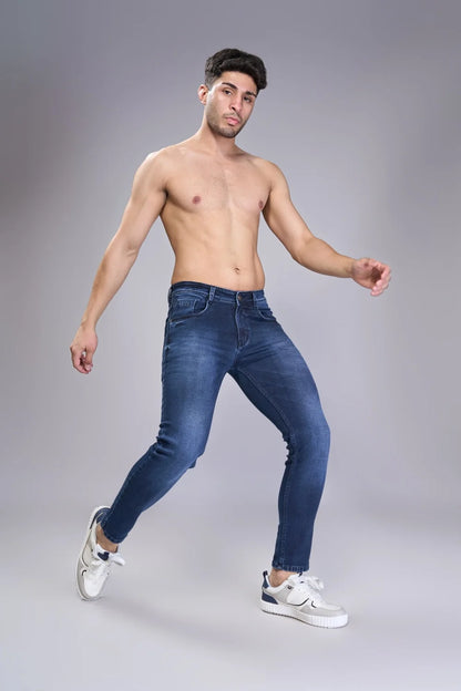 Stretch demonstration of Oxford Blue ankle fit jeans for boys

