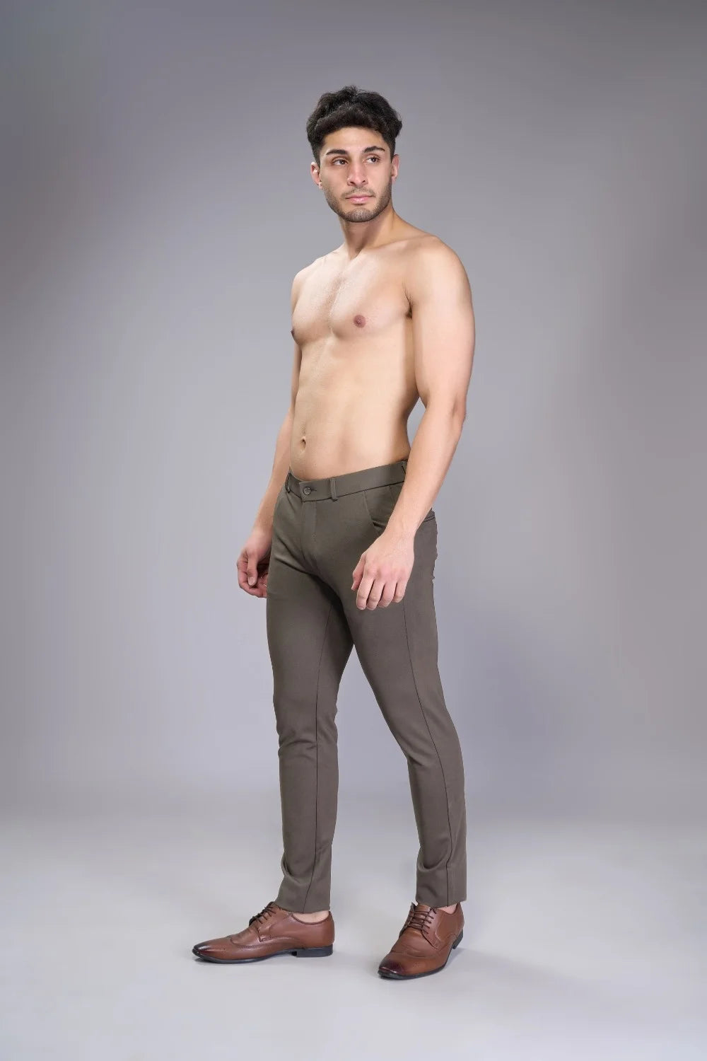 Performance-weave beige trousers offering structure and soft stretch

