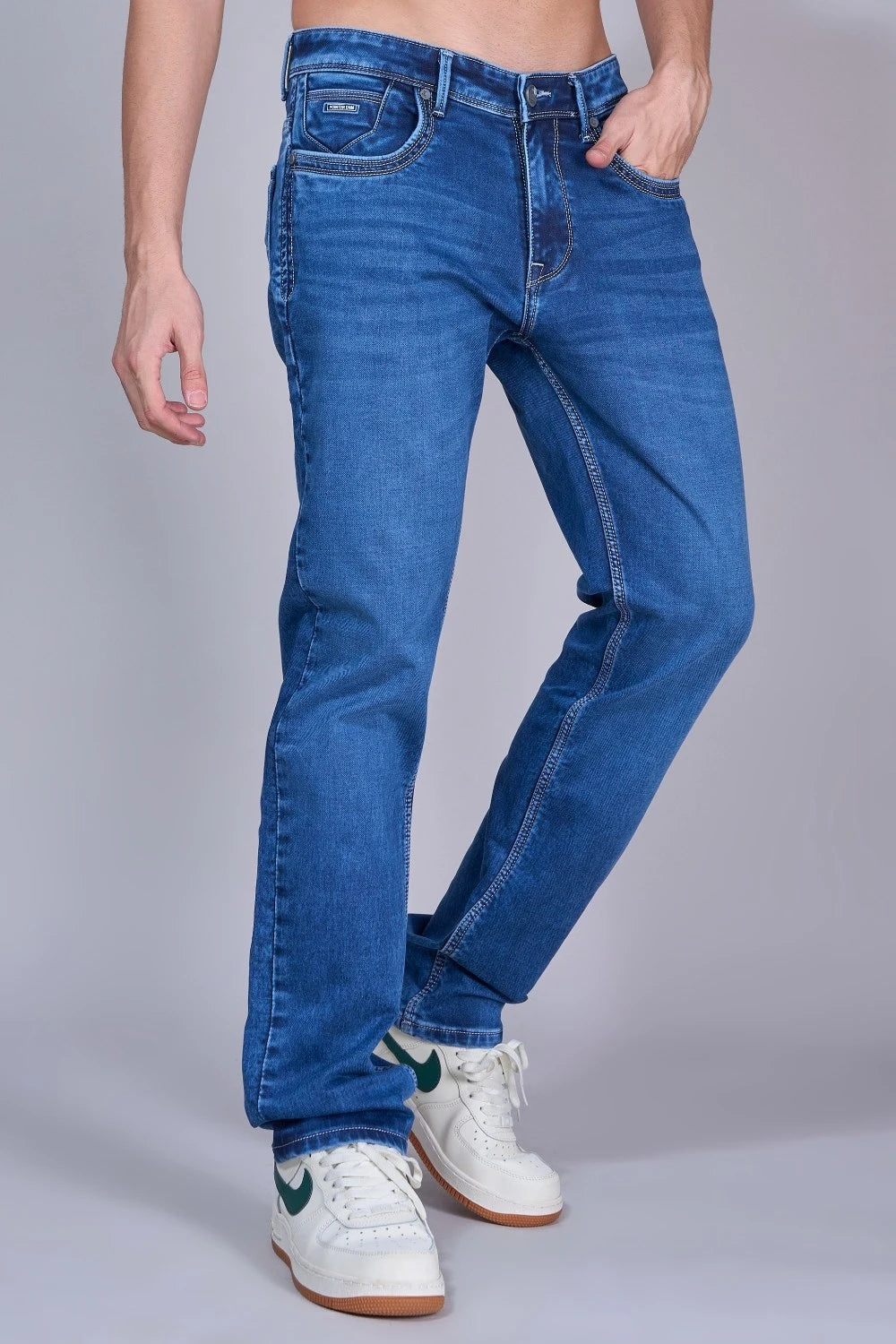 Side profile of Pointer Jeans dark blue straight fit denim