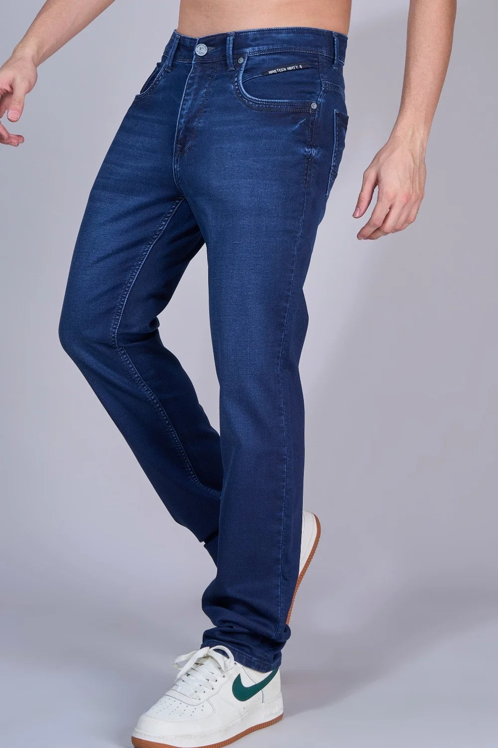 Close-up of stretchable royal blue denim fabric