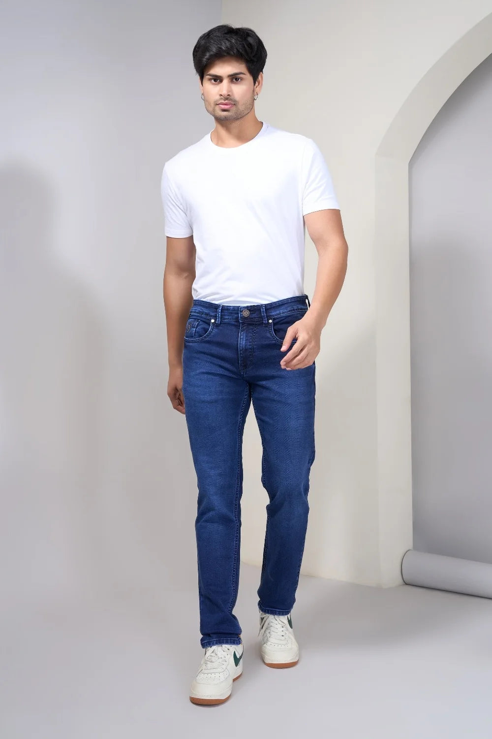 Model presenting breathable stretch regular fit denim for men