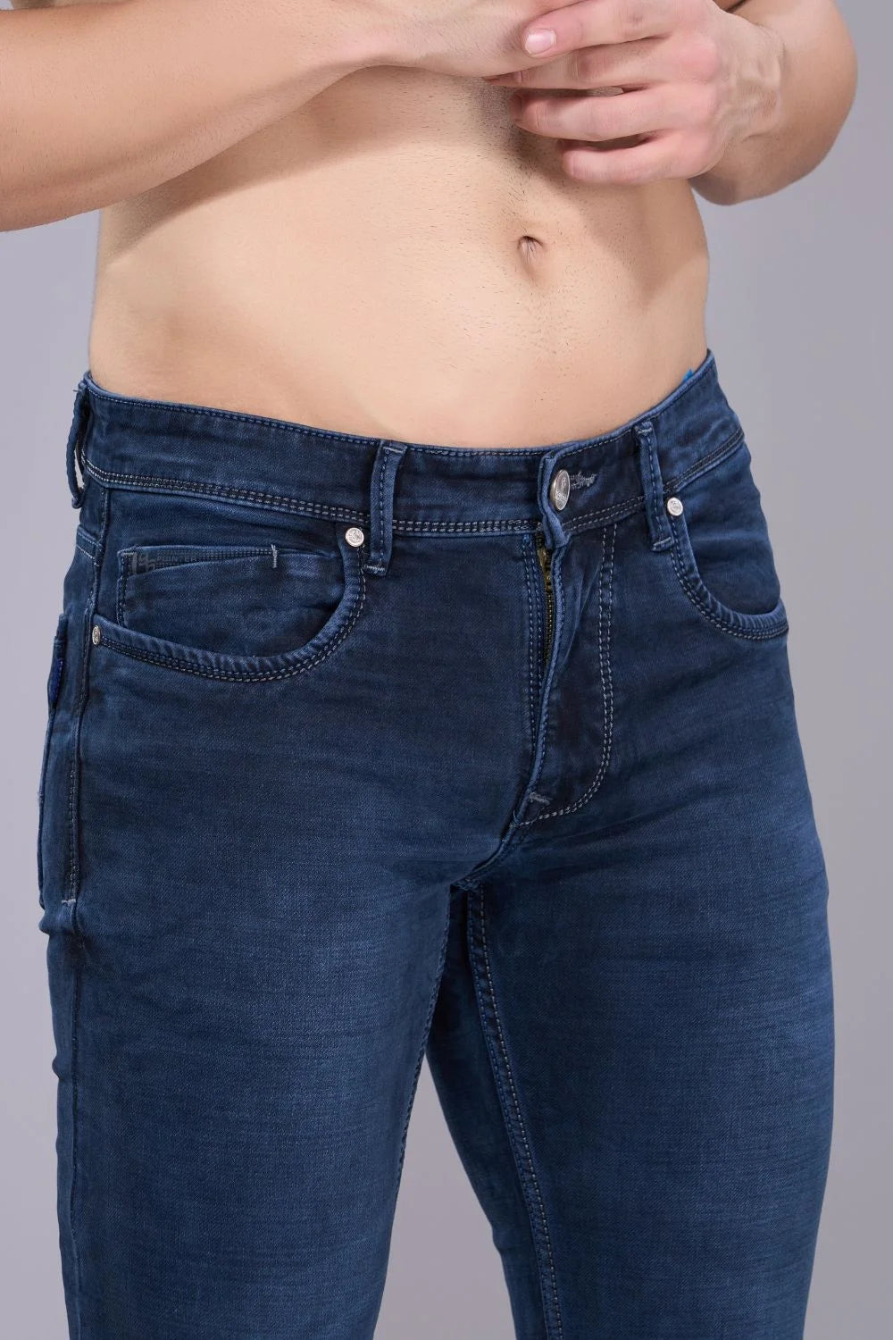 Close-up of premium denim fabric used in men’s regular fit jeans
