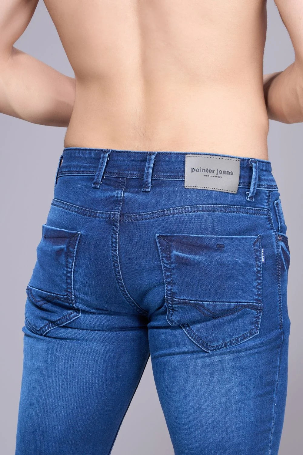 Back view of men’s premium stretchable regular fit jeans
