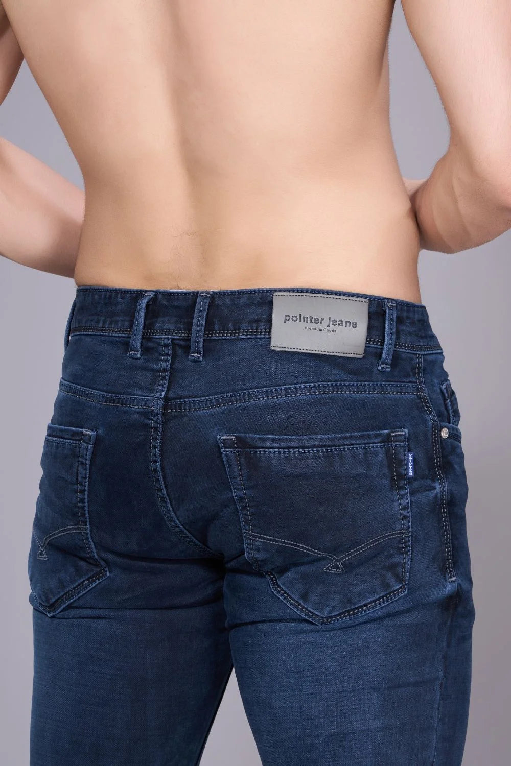 Back view of men’s mid-rise regular fit denim jeans
