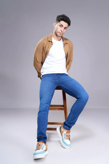 Styling demo showing men’s regular fit stretch jeans with casual outfit

