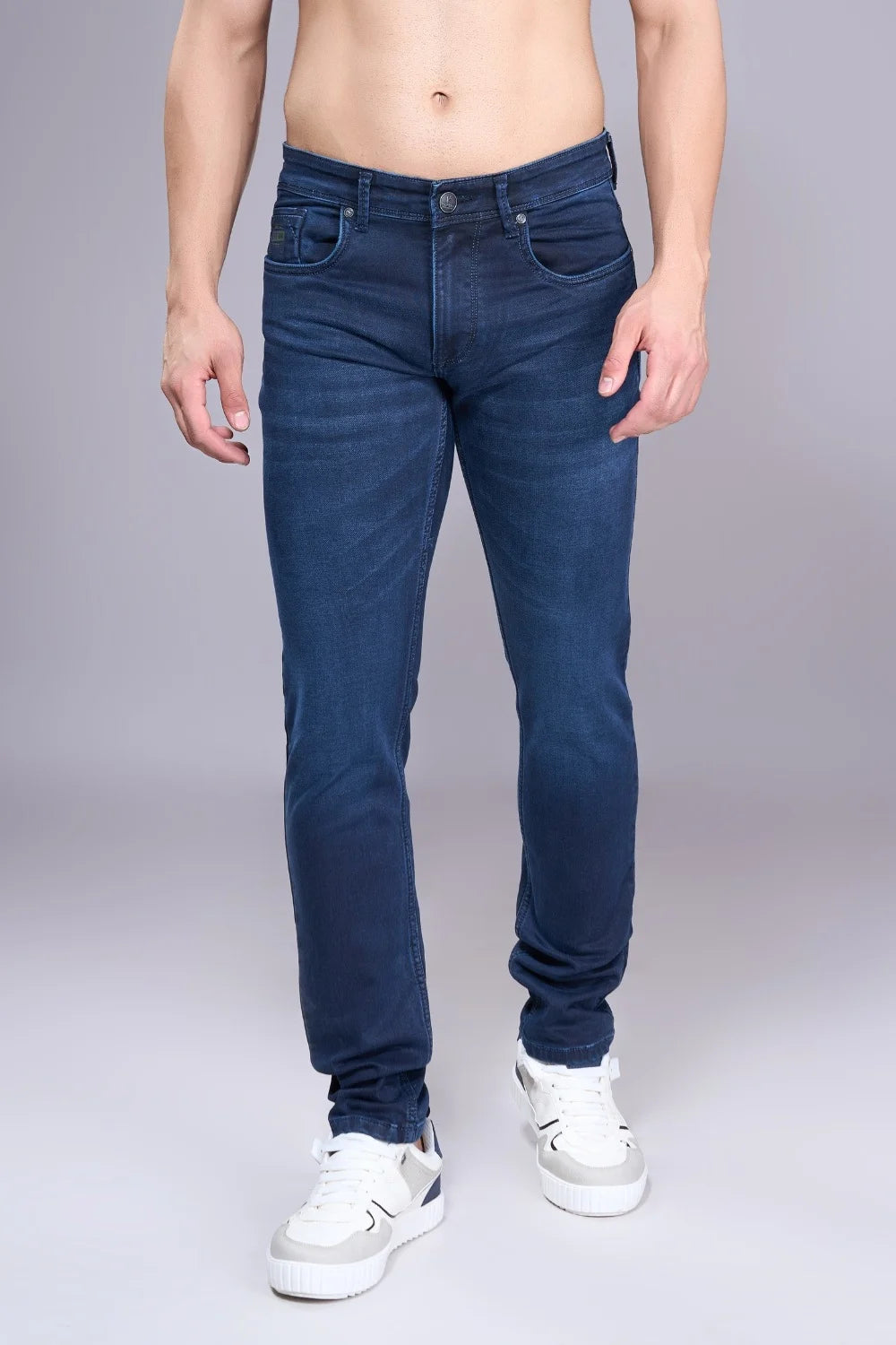 Front view of regular jeans for men in classic blue denim
