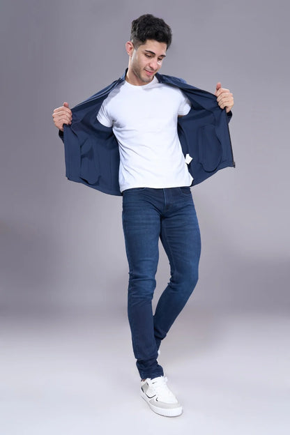 Model wearing regular jeans for men styled with casual outfit
