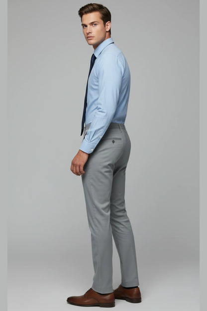 Waist-level shot showing how a leather shoe fits with the dark grey trousers