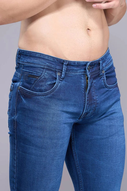 Close-up view of soft stretch regular fit denim jeans for men
