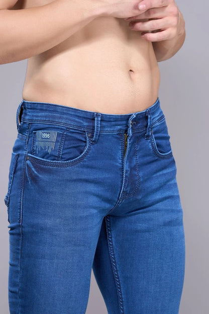 Close-up of flexible stretchable denim fabric in men’s regular fit jeans
