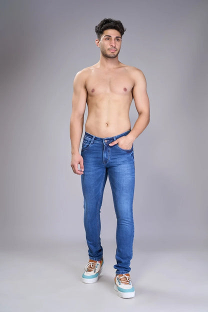 Flexibility shot showing stretchable navy blue jeans for men
