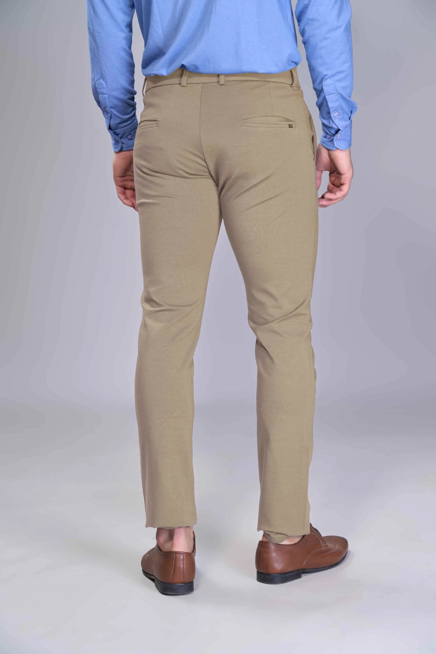 Modern tapered-fit khaki trousers with reinforced stitching
