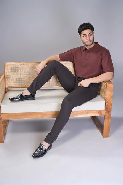 Travel-ready flexible brown pants ideal for commuting and flights
