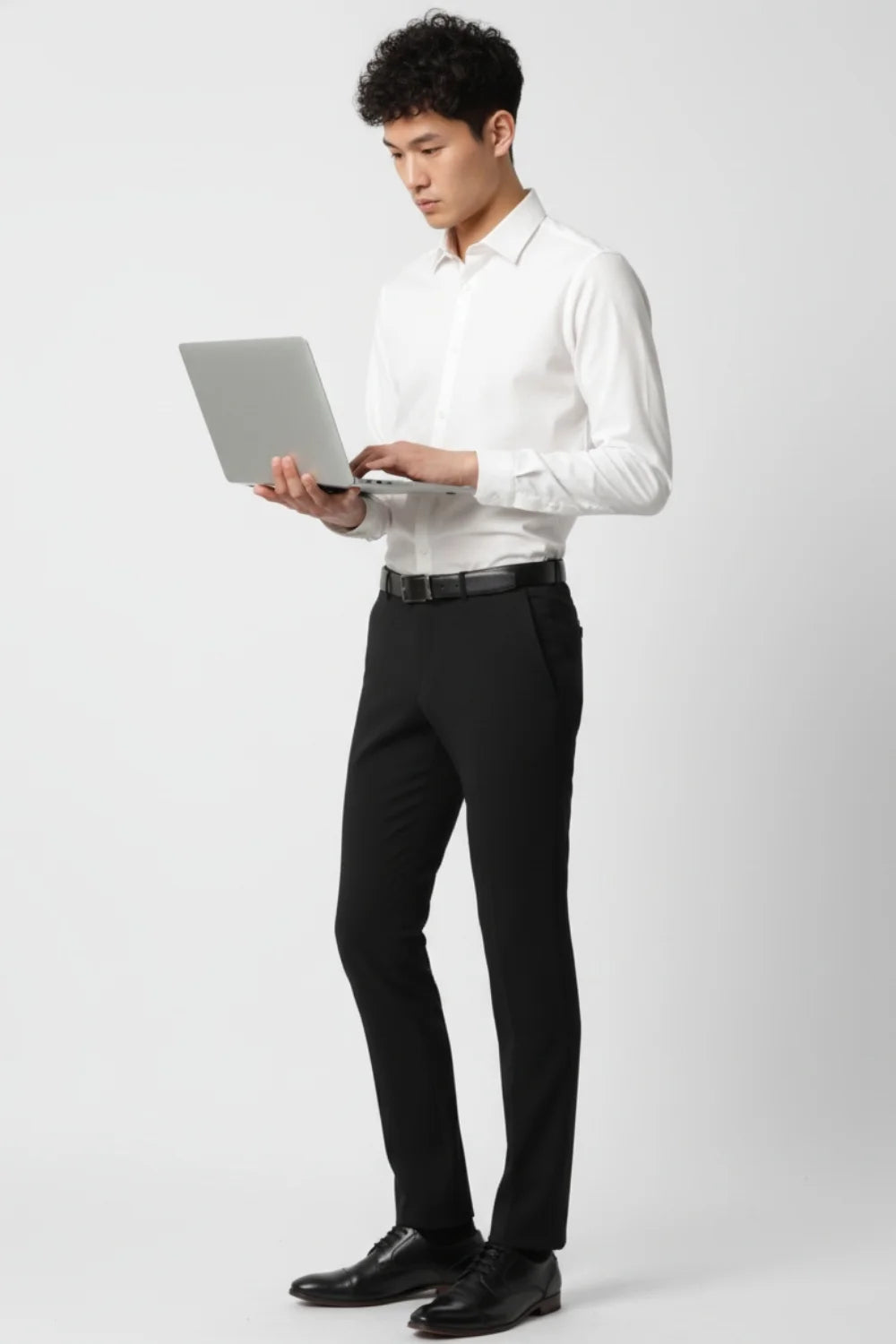 Styling suggestions: black trousers paired with blazer and dress shirt
