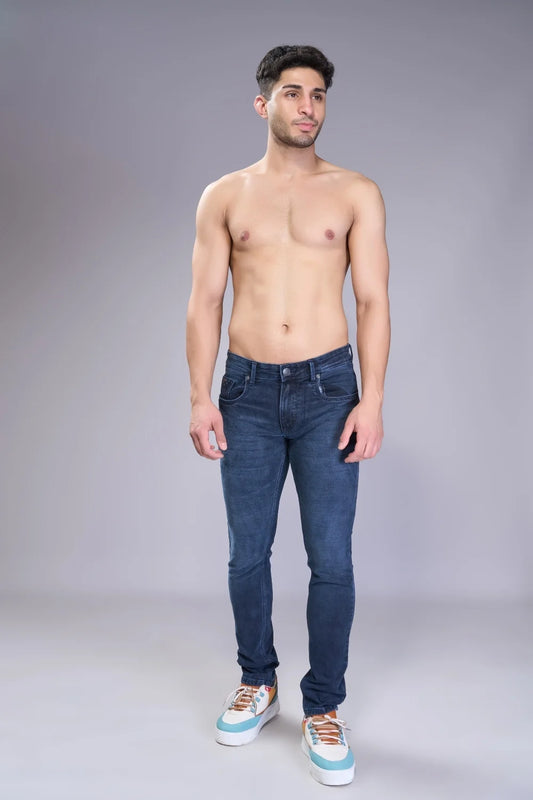 Front pose of men’s vintage blue jeans in regular fit
