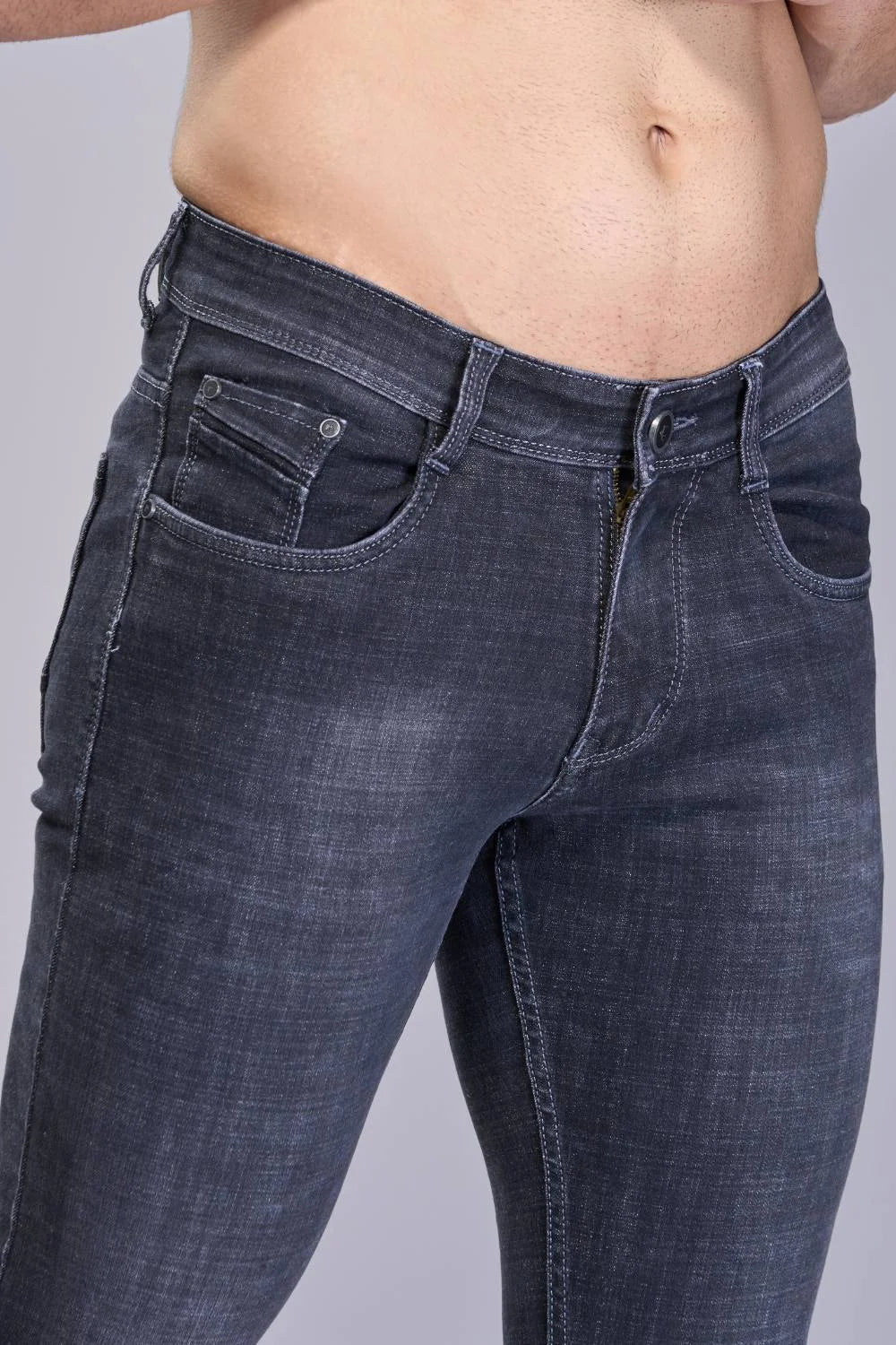 Waistband comfort design and pocket geometry for secure storage
