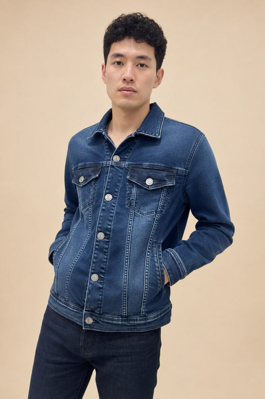 Men's winter denim jacket on warm beige studio background
