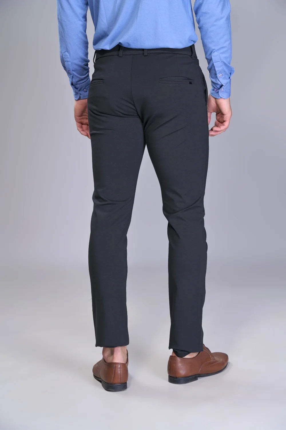 Wrinkle-resistant black trousers ideal for office and travel use
